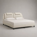 Polsterbett Doppelbett 180 x 200 cm, Gesamtmaß 220 x 200 x 112 cm, Kunstlederbezug, geteiltes Kopfteil, Cremeweiß/Schwarz